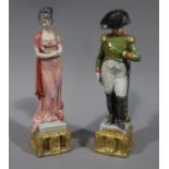 A pair of Naples figures of Napoleon and Josephine on gilt bases, 28cm high,