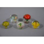 Five paperweights,