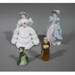 A Coalport porcelain figure 'Southern Belle', another Royal Worcester figure 'Masquerade',