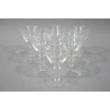 A set of six commemorative glass wines each with conical bowl,