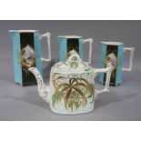 A graduated set of three late Victorian/Edwardian jugs each of panelled hexagonal form decorated