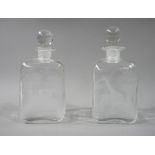 A pair of square decanters each wheel engraved with African animals including rhinoceros,