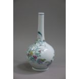 A reproduction Chinese bottle shaped vase the body painted with quail amidst flowers and leafage,