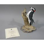 A Wedgwood Canadian bird collection Downy Woodpecker, limited edition numbered 136/500, 19cm high,