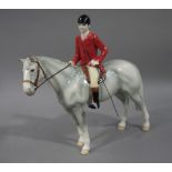 A Beswick huntsman on dappled grey hunter signed to the underside John Beswick number 15/250,