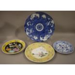 Four various Chinese and Japanese porcelain plates