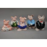 A set of five Nat West Wade piggy banks