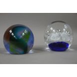 Two glass paperweights,