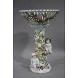 A continental porcelain pedestal basket,