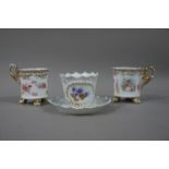 A pair of Austrian Victoria china porcelain cabinet cups transfer printed in the manner of Angelica