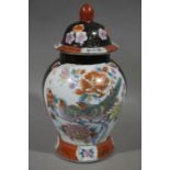 A Chinese vase and cover printed in enamel with birds amongst peony,