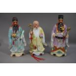 Three Chinese ceramic figures of immortals