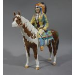 A Beswick model of a Native American Indian on horseback complete with Beswick stamp and paper