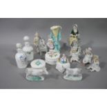 A small quantity of decorative items including three bisque piano top figures,