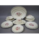 A Susie Cooper part service comprising plates in three sizes, three graduated meat dishes,