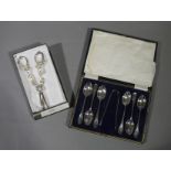 A set of six silver plated teaspoons and pair of matching sugar tongs,