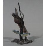 Border Fine Arts model of an otter chasing two trout,