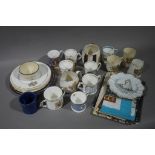 A collection of Victorian and later Royal Commemorative ware including Ewenny pottery blue glaze