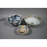 Three decorative Chinese porcelain bowls one painted internally with extensive landscape and boats