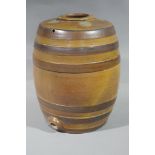 A saltglaze barrel with moulded banding, impressed $,