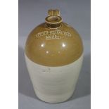 A brown dipped stoneware flagon,