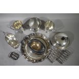 A quantity of silver plated ware including pair of toast racks, muffin dish and cover,