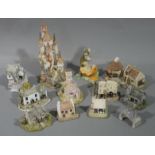 A quantity of Lilliput Lane houses, including The Castle of the Sleeping Princess, Wedding Bells,