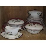 A Wedgwood Mayfield pattern part dinner service transfer printed with poppies on the cream ground