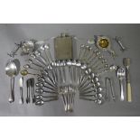 A silver plated hip flask, a silver plated tea strainer, tastevin, miscellaneous silver cutlery,