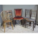 A mahogany stained beech single chair with bead carved frame stuffed over back and serpentine seat