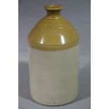 A brown dipped stoneware flagon impressed W.