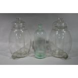 A pair of glass three section cooking jars 40cm high and a chemist's bottle 37cm high