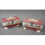 A pair of English pottery caskets of serpentine shaped rectangular form,