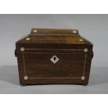 A post Regency mahogany rosewood veneered tea caddy outlined throughout with mother of pearl