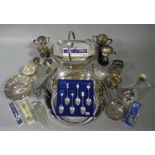 A quantity of silver plated ware including cake basket, entrée dish and cover, goblet, trophy cups,