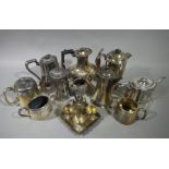 A quantity of silver plated ware including coffee pot, teapots, hot water jugs, egg frame,