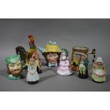 Four Artone pottery figures, a Radnor bone china character mug, Beswick dollyvardon teapot,