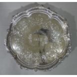 A good Victorian shaped circular salver, the border bead and leaf cast,