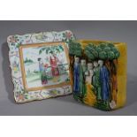 A Chinese famille verte shaped square dish painted to the centre with female figures in a garden