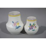 Two graduated Poole pottery vases,