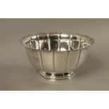 A silver plated shaped circular fluted bowl, 23.