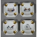 A set of four Limoges ashtrays each transfer printed with a form of transport with gilt rests and