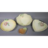 Three Carlton ware leaf moulded dishes and bowls;