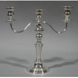 A George III style silver plated two armed candelabra,