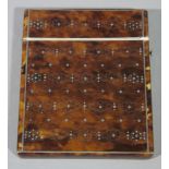 A 19th century tortoise shell and silver piquet work gentleman's card case
