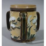 A Lambeth Doulton three handled mug,