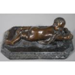 A reproduction Della Robbia style bronze figure,