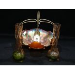 A Carnival Glass Serving Bowl Within A Plated Stand, Together With A Pair Of Narrow Necked Tinted