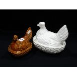 A White Glazed Staffordshire Pottery Hen On Nest Together With A Similar Brown Glazed Example