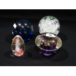 Four 20th Century Glass Paperweights